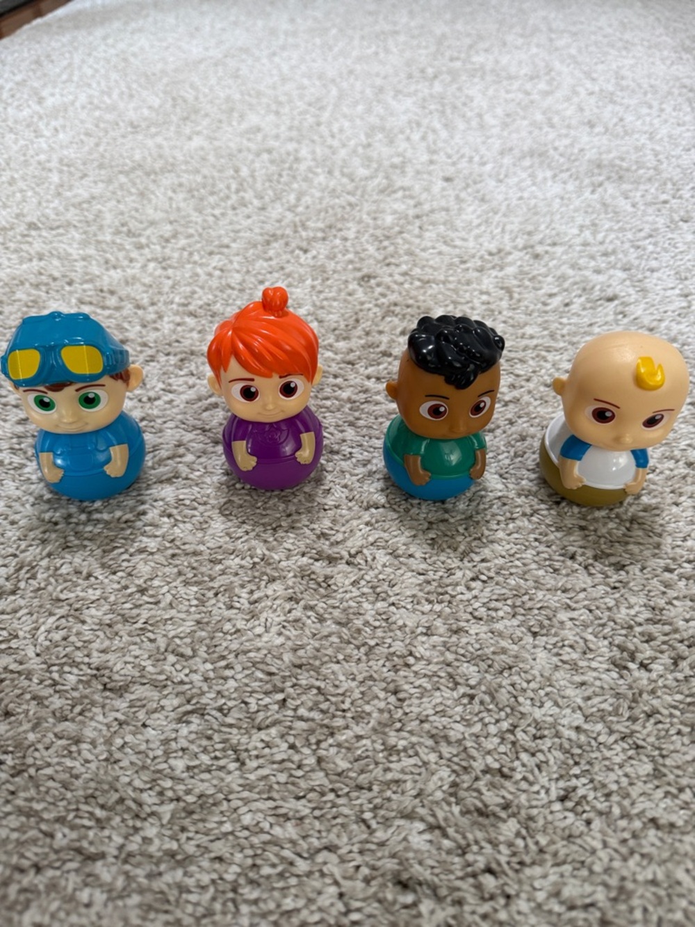 Set of 4 CoComelon bobble toys